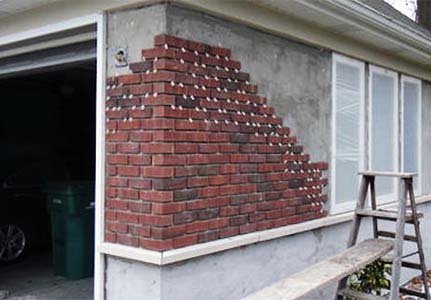 Brick being installed